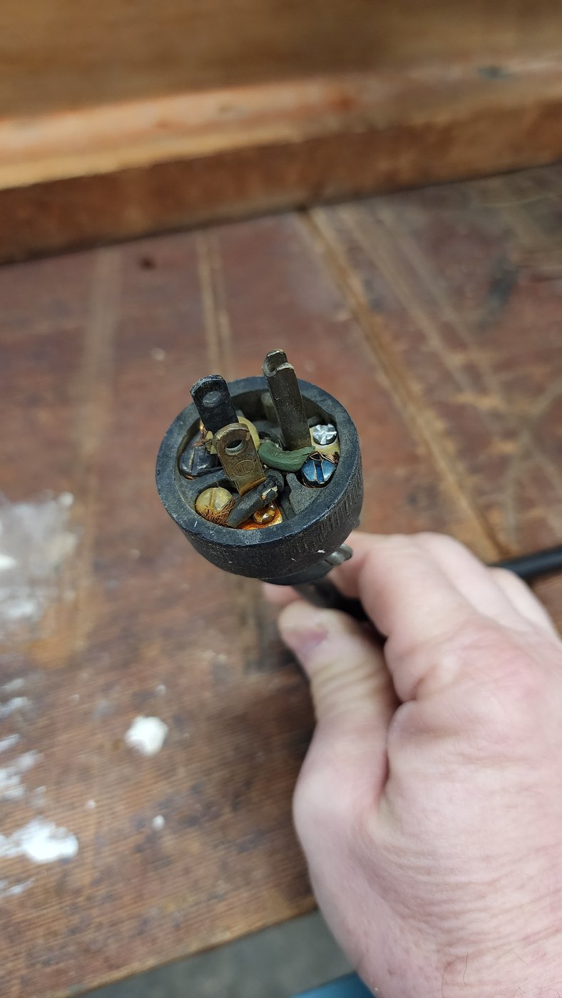 Old plug before replacement