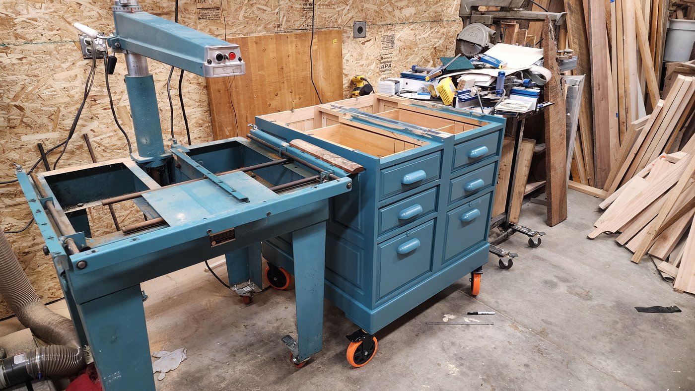 Assembling the restored saw and cabinet