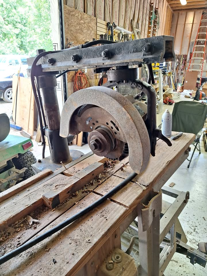 DeWalt Wonder Worker radial arm saw set up on a workbench in the shop