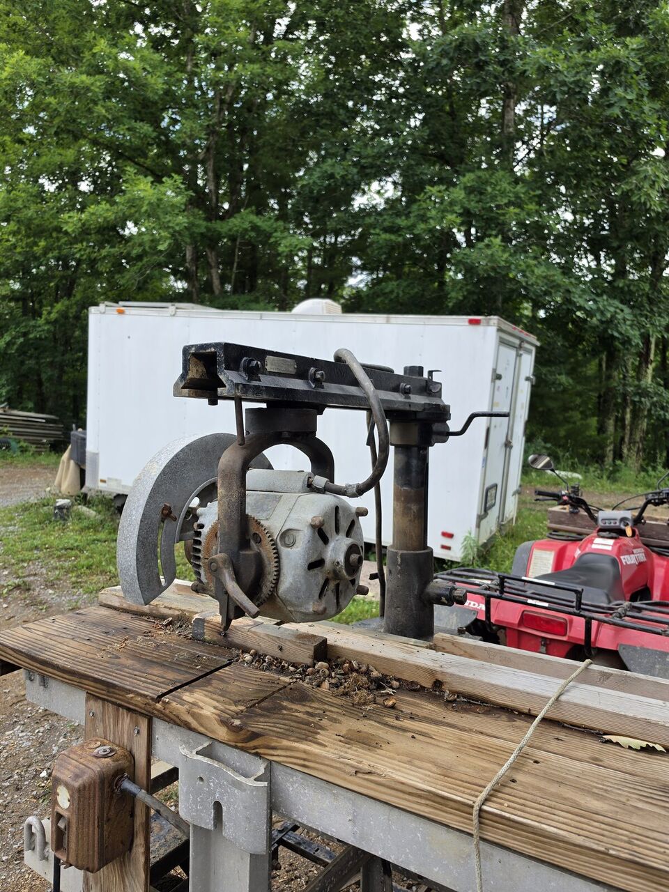 The reassembled saw on its stand, portrait view